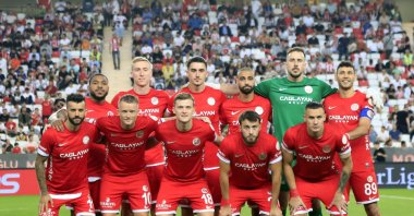 Antalyaspor players pose for a photo before a match with Adana Demirspor, May 17, 2024. (IHA Photo)