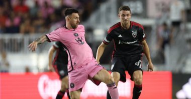Inter Miami Lionel Messi (L) controls the ball against D.C. United defender Christopher McVey in the first half at Chase Stadium, Fort Lauderdale, Florida, U.S., May 18, 2024. (Reuters Photo)