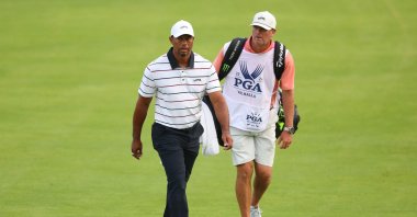 Tiger Woods and his caddie, Lance Bennett, walk the 18th fairway during the second round of the 2024 PGA Championship at Valhalla Golf Club, Louisville, Kentucky, U.S., May 17, 2024. (AFP Photo)