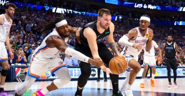 Dallas Mavericks guard Luka Doncic (C) passes the ball during the second half in game six of the second round of the 2024 NBA playoffs against Oklahoma City Thunder, American Airlines Center, Dallas, U.S., May 19, 2024. (Reuters Photo)