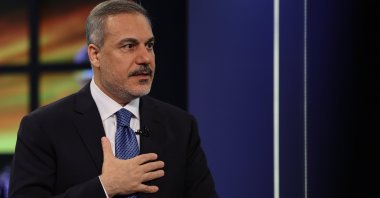 Foreign Minister Hakan Fidan speaks at a live interview with a Turkish broadcaster, Istanbul, Türkiye, May 15, 2024. (AA Photo)