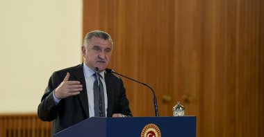 Youth and Sports Minister Osman Aşkın Bak speaks at Parliament, Ankara, Türkiye, May 17, 2024. (AA Photo)