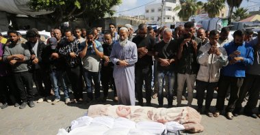 Palestinians hold a funeral prayer for their relatives killed by Israeli airstrikes at the Nuseirat refugee camp, the Gaza Strip, Palestine, May 15, 2024. (AA Photo)