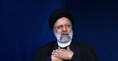 Iranian President Ebrahim Raisi gestures during a funeral in Kerman, Iran, Jan. 5, 2024. (AP Photo)