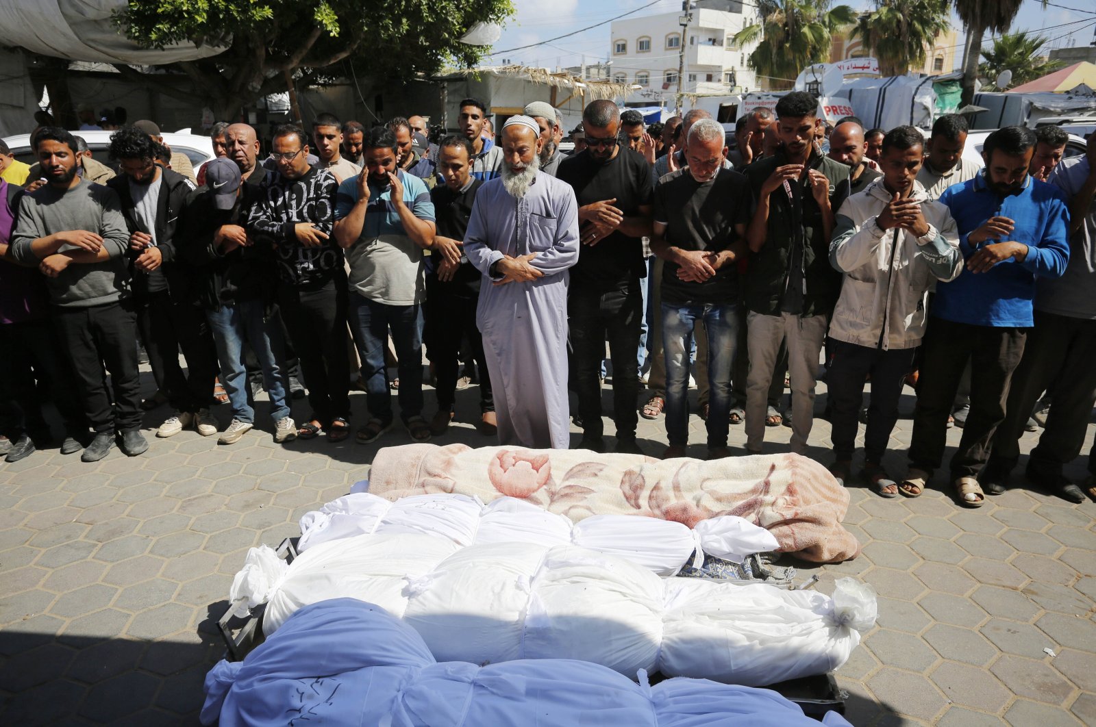 Palestinians hold a funeral prayer for their relatives killed by Israeli airstrikes at the Nuseirat refugee camp, the Gaza Strip, Palestine, May 15, 2024. (AA Photo)