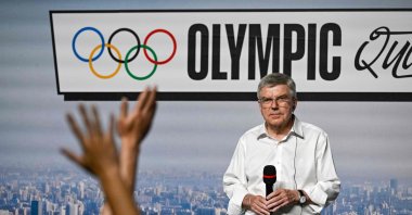 International Olympic Committee (IOC) President Thomas Bach prepares to answer a question at a press conference during the Olympic Qualifier Series for breaking, BMX freestyle, skateboarding, and sport climbing events ahead of the Paris 2024 Olympic and Paralympic Games, Shanghai, China, May 19, 2024. (AFP Photo)