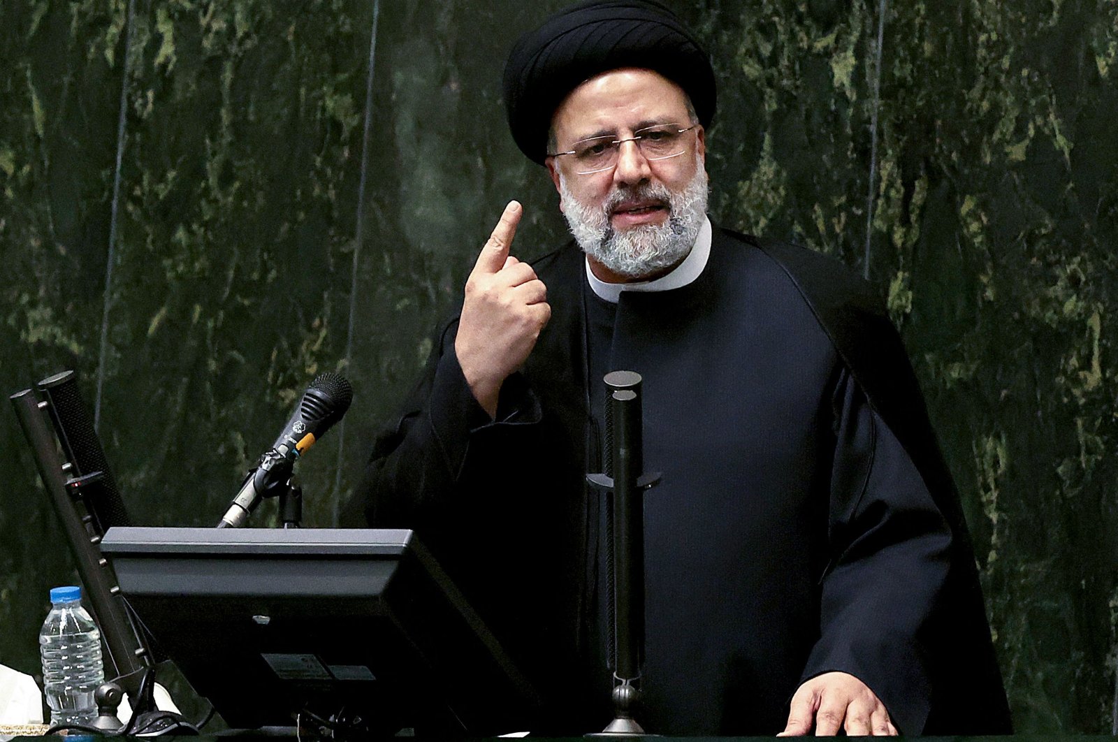 Iran&#039;s President Ebrahim Raisi speaks before parliament in the capital Tehran, Iran, August 25, 2021. (AFP Photo)