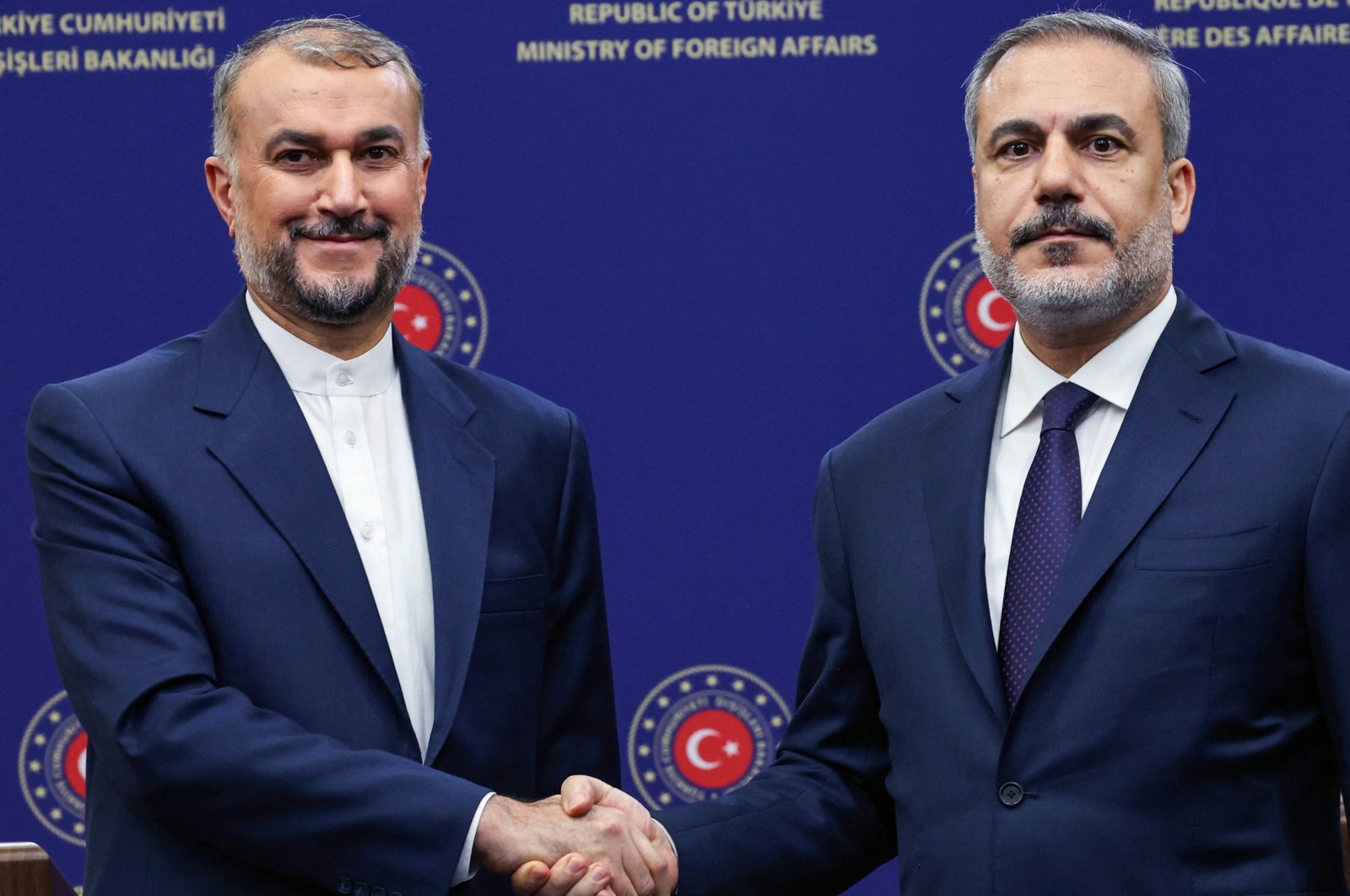 Late Iranian Foreign Minister Hossein Amirabdollahian (L) shakes hands with Foreign Minister Hakan Fidan, Ankara, Türkiye, Nov. 1, 2023. (AFP Photo)