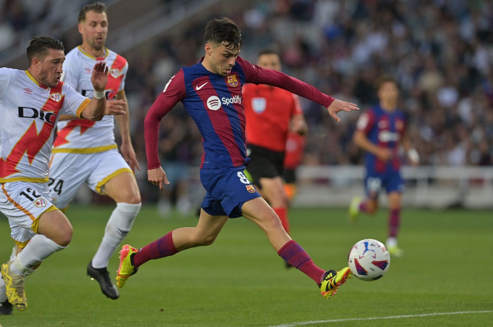 Barcelona&#039;s Pedri kicks the ball and scores his team&#039;s third goal during the La Liga match against Rayo Vallecano at the Estadi Olimpic Lluis Companys, Barcelona, Spain, May 19, 2024. (AFP Photo)