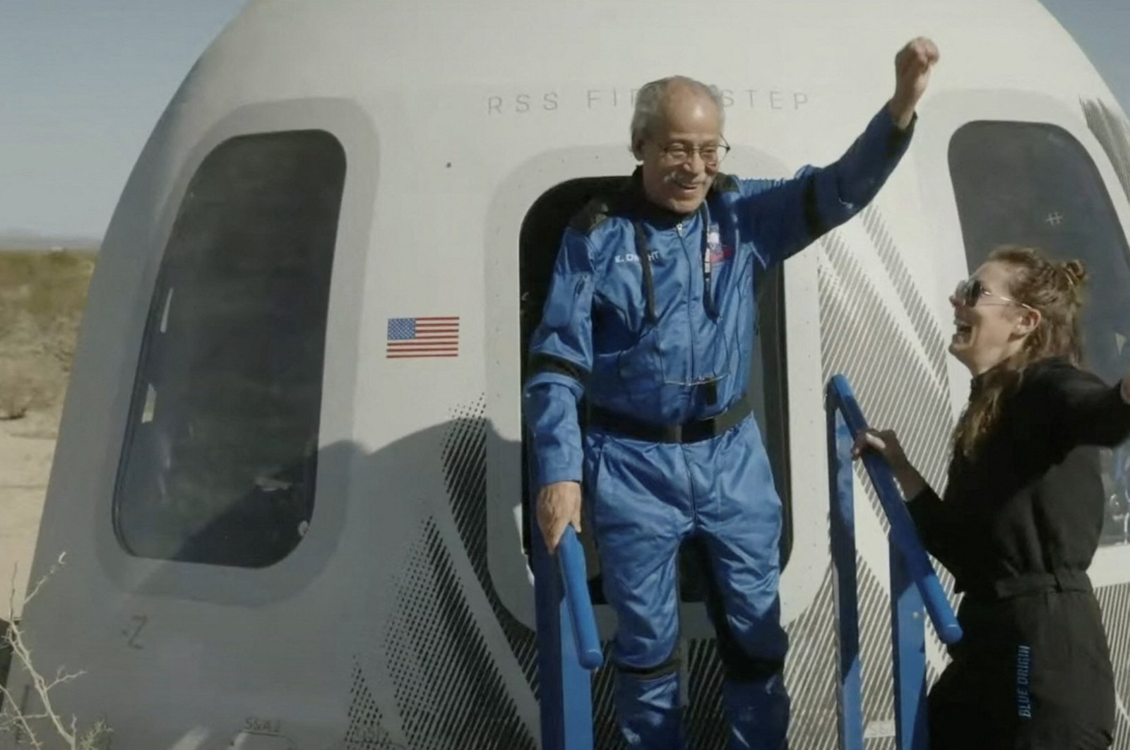 This screen grab taken from a Blue Origin broadcast shows Ed Dwight celebrating as he exits the Mission NS-25 crew capsule, upon landing near the Blue Origin base near Van Horn, Texas, U.S., May 19, 2024. (AFP Photo)