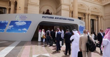Visitors line up at the security checkpoint as they arrive to attend the Future Aviation Forum in Riyadh, Saudi Arabia, May 9, 2022. (Reuters Photo)
