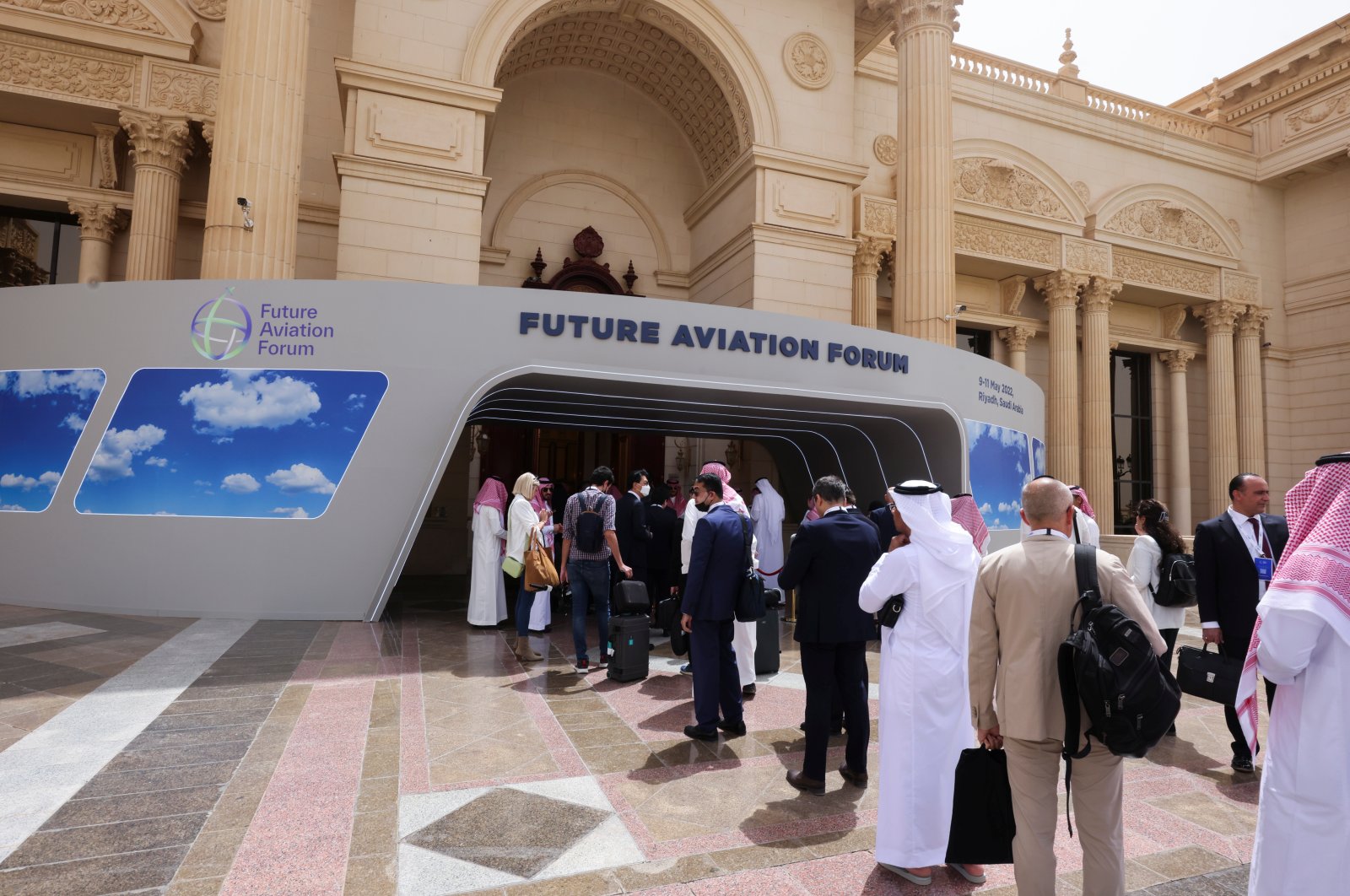 Visitors line up at the security checkpoint as they arrive to attend the Future Aviation Forum in Riyadh, Saudi Arabia, May 9, 2022. (Reuters Photo)