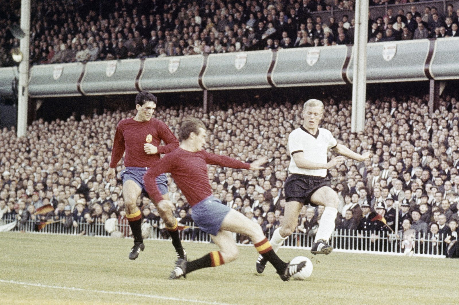 West Germany&#039;s Karl-Heinz Schnellinger (R) vies for the ball with two Spanish players during their World Cup match at Villa Park, Birmingham, U.K., July 20, 1966. (AP Photo)