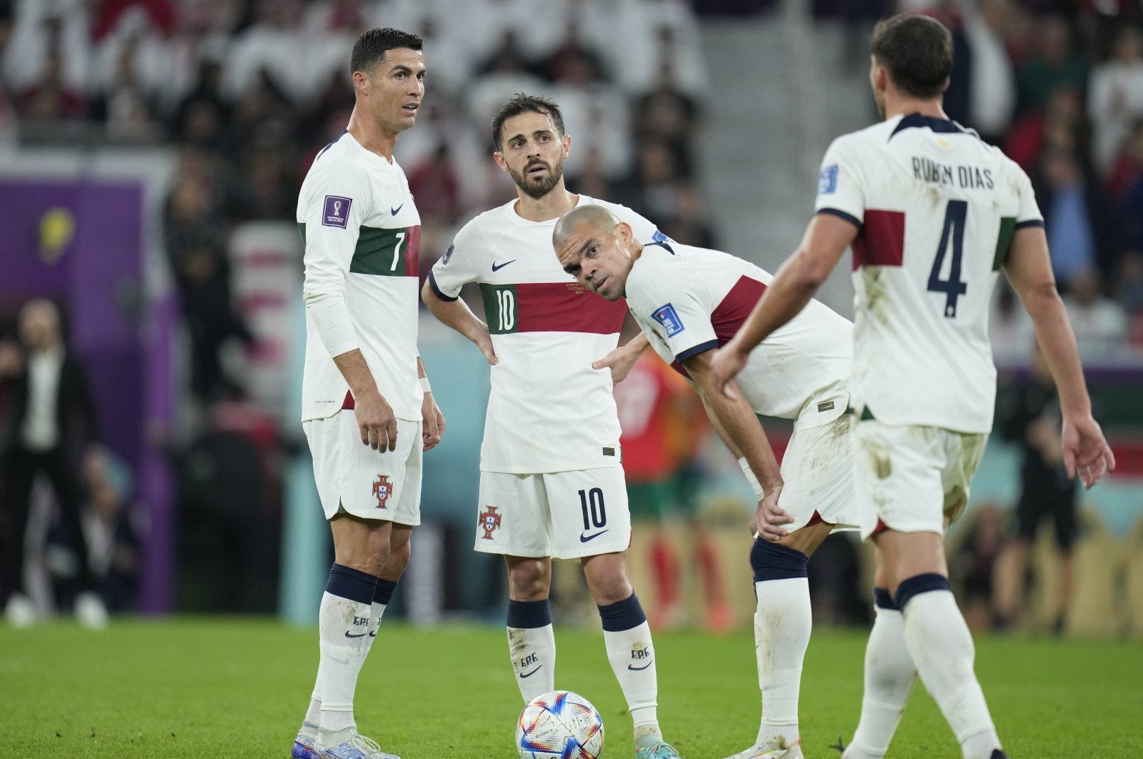 (L-R) Portugal&#039;s Cristiano Ronaldo, Bernardo Silva, Pepe and Ruben Dias prepare for a free kick during the World Cup quarterfinal match against Morocco, at Al Thumama Stadium, Doha, Qatar, Dec. 10, 2022. (AP Photo)