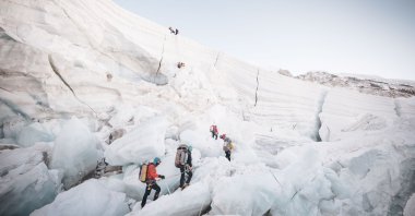 A handout photo made available by Seven Summit Trek shows climbers on a glacier at a base camp, 5,364 meters (17,598 feet) above sea level, Mount Everest, Nepal, April 26, 2024. (EPA Photo)