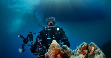 A diver explores Dalyan Canal, Muğla, western Türkiye, May 22, 2024. (AA Photos)