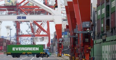 A container ship is loaded at a port in Tokyo, Japan, May 22, 2024. (EPA Photo)
