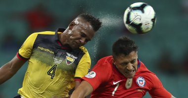 Ecuador's Pedro Velasco (L) and Chile's Alexis Sanchez go for a header during a Copa America Group C match at the Arena Fonte Nova, Salvador, Brazil, June 21, 2019. (AP Photo)
