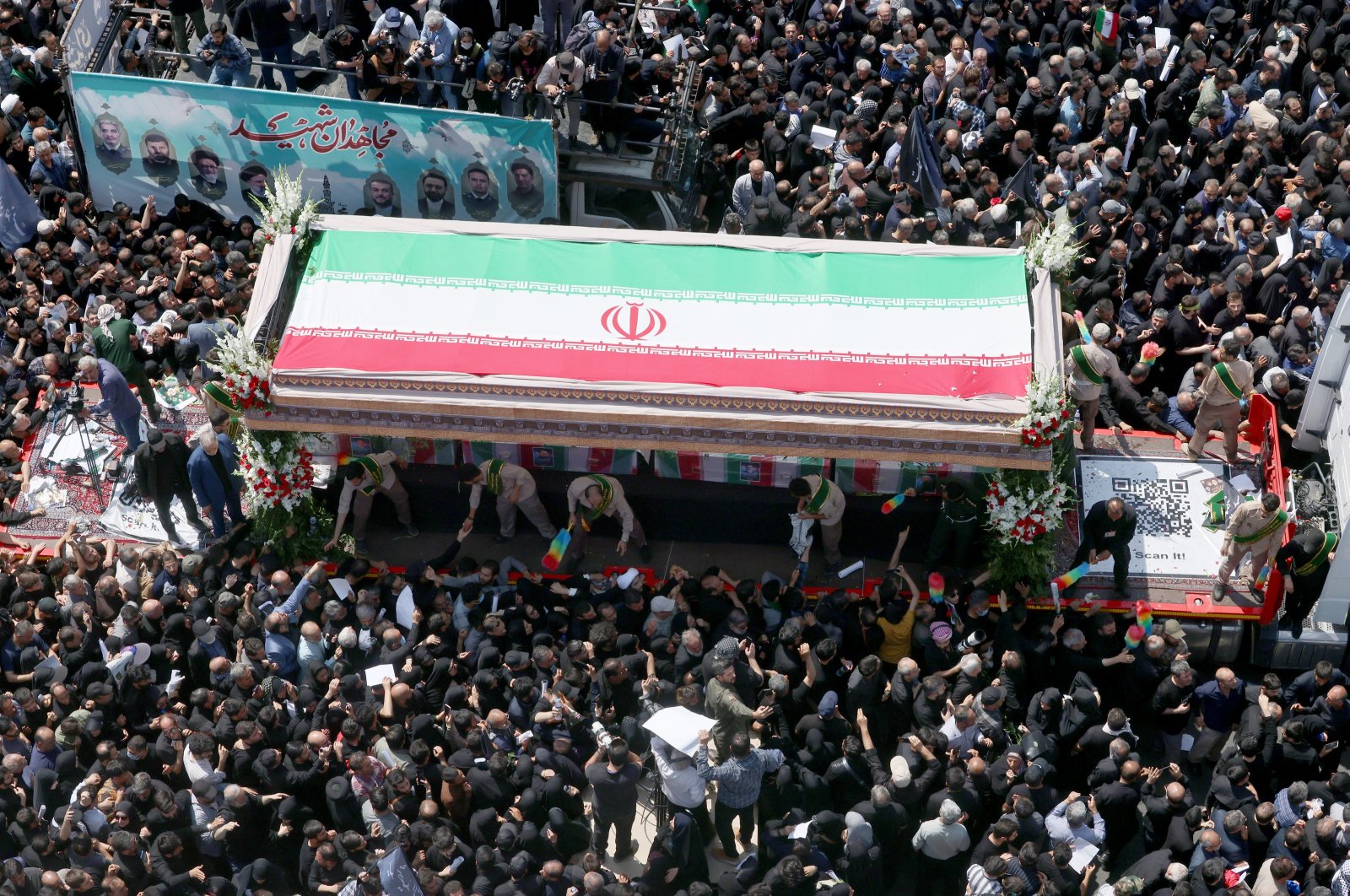 Iranians take part in a funeral ceremony for late President Ebrahim Raisi in Tehran, Iran, May 22, 2024. (EPA Photo)