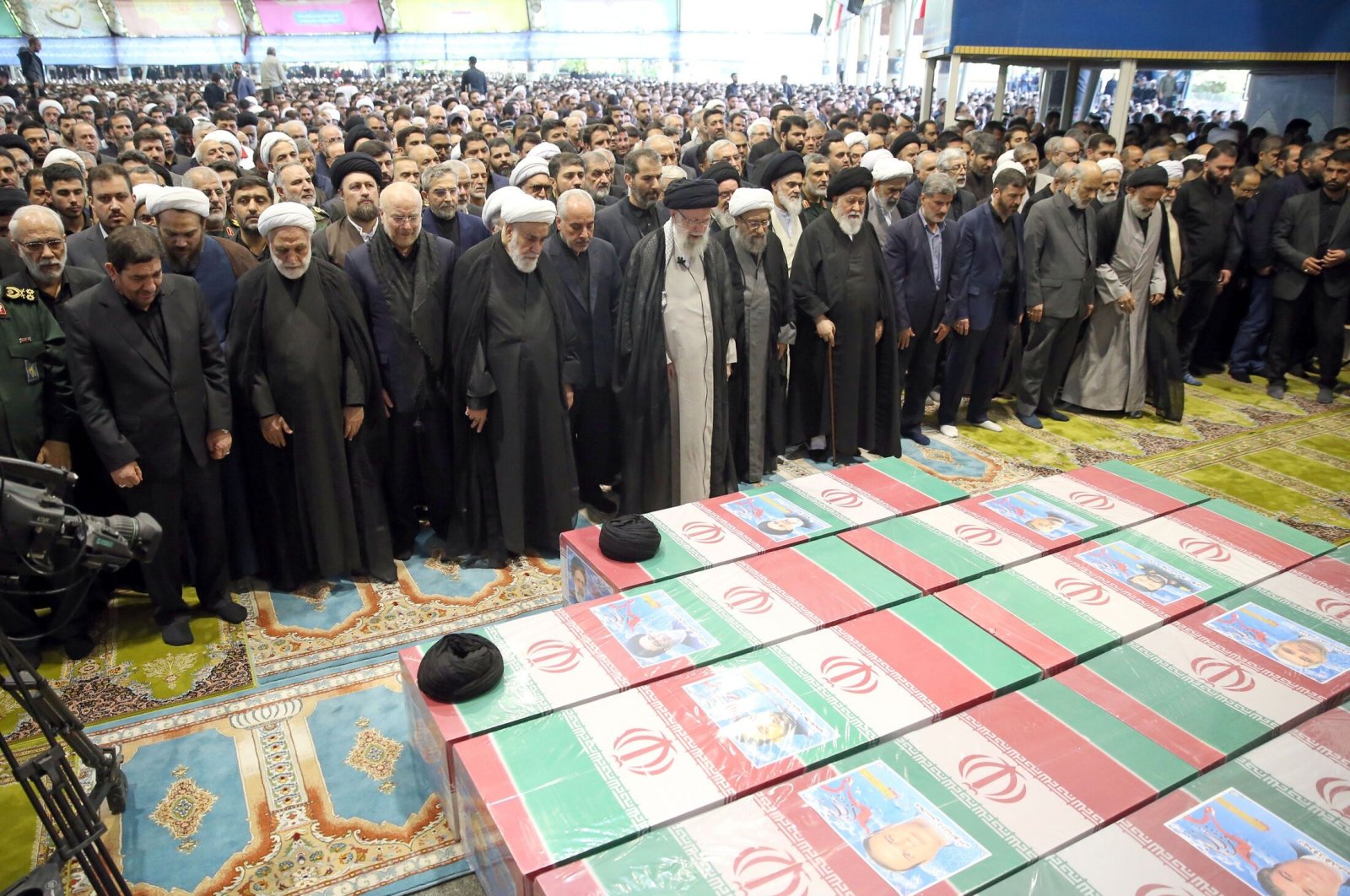 Iranian supreme leader Ayatollah Ali Khamenei (C) leads a funeral prayer for late president Ebrahim Raisi and the rest of the victims in Tehran, Iran, May 22, 2024. (EPA Photo)