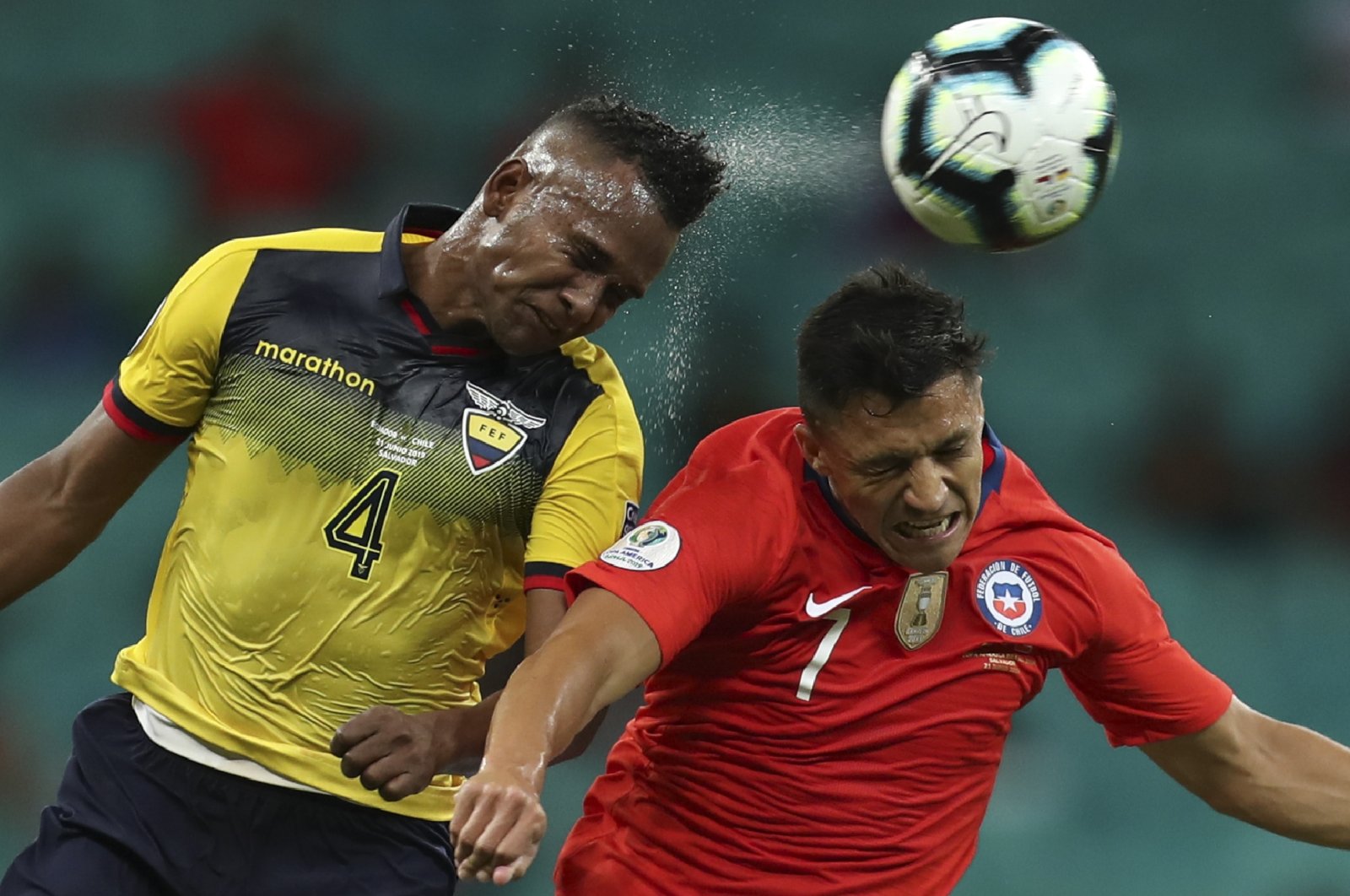 Ecuador&#039;s Pedro Velasco (L) and Chile&#039;s Alexis Sanchez go for a header during a Copa America Group C match at the Arena Fonte Nova, Salvador, Brazil, June 21, 2019. (AP Photo)