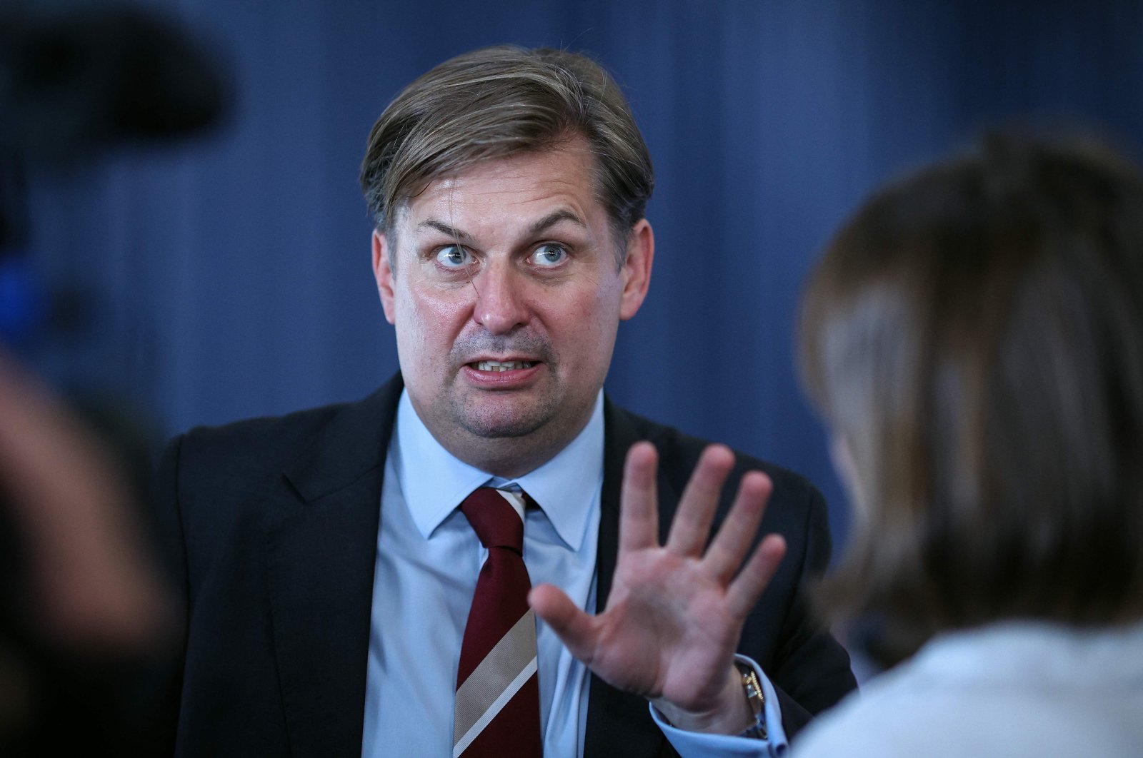 Member of the far-right Alternative for Germany (AfD) party Maximilian Krah gestures as he gives an interview during 14th federal party congress of German far-right party Alternative for Germany (AfD - Alternative fuer Deutschland) at the trade fair in Magdeburg, eastern Germany on July 28, 2023. (AFP Photo)