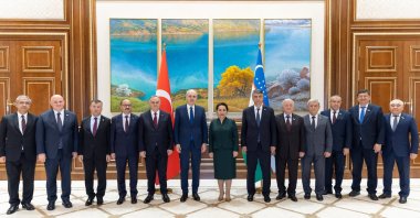 Turkish Parliament Speaker Numan Kurtulmuş (L-6) poses with Tanzila Narbayeva, the chairperson of the Senate of the Oliy Majlis (L-7) after their meeting in Tashkent, Uzbekistan, May 22, 2024. (AA Photo)