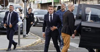 French President Emmanuel Macron (C) visits the central police station in Noumea, France's Pacific territory of New Caledonia, May 23, 2024. (EPA Photo)
