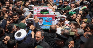 Soldiers carry the coffin of late Iranian president Ebrahim Raisi and others in Birjand, Iran, May 23, 2024. (AFP Photo)