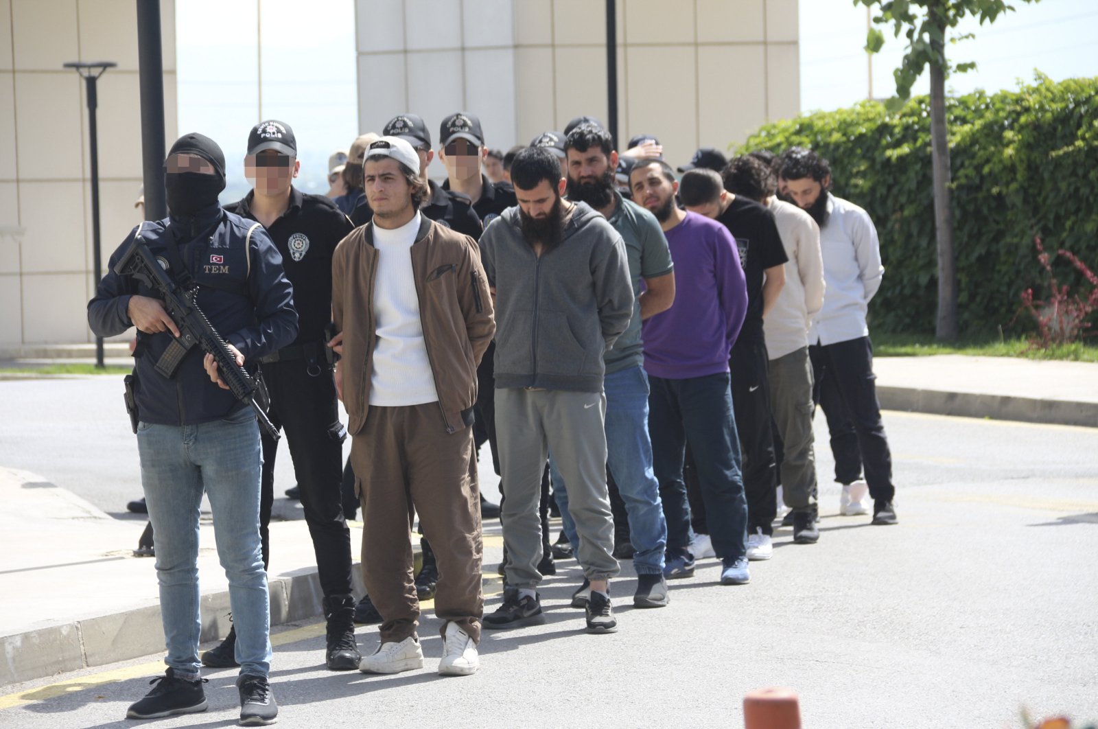 Police escort captured Daesh suspects in Manisa, western Türkiye, May 21, 2024. (AA Photo)