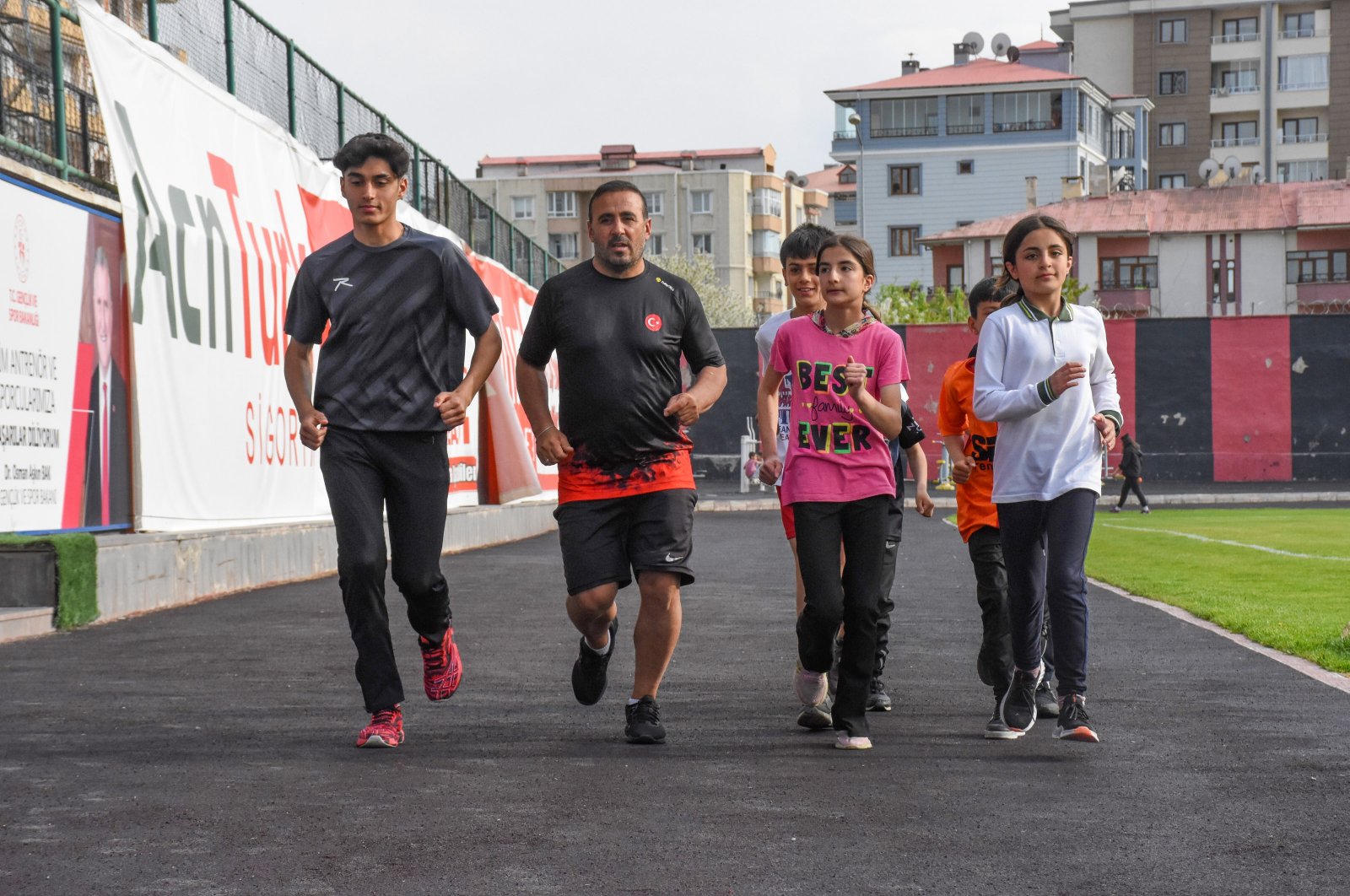 Turkish former Olympics athlete Ersin Tacir (2nd L) trains with his young athletes at the Van Atatürk Stadium, Van, Türkiye, May 23, 2024. (AA Photo)