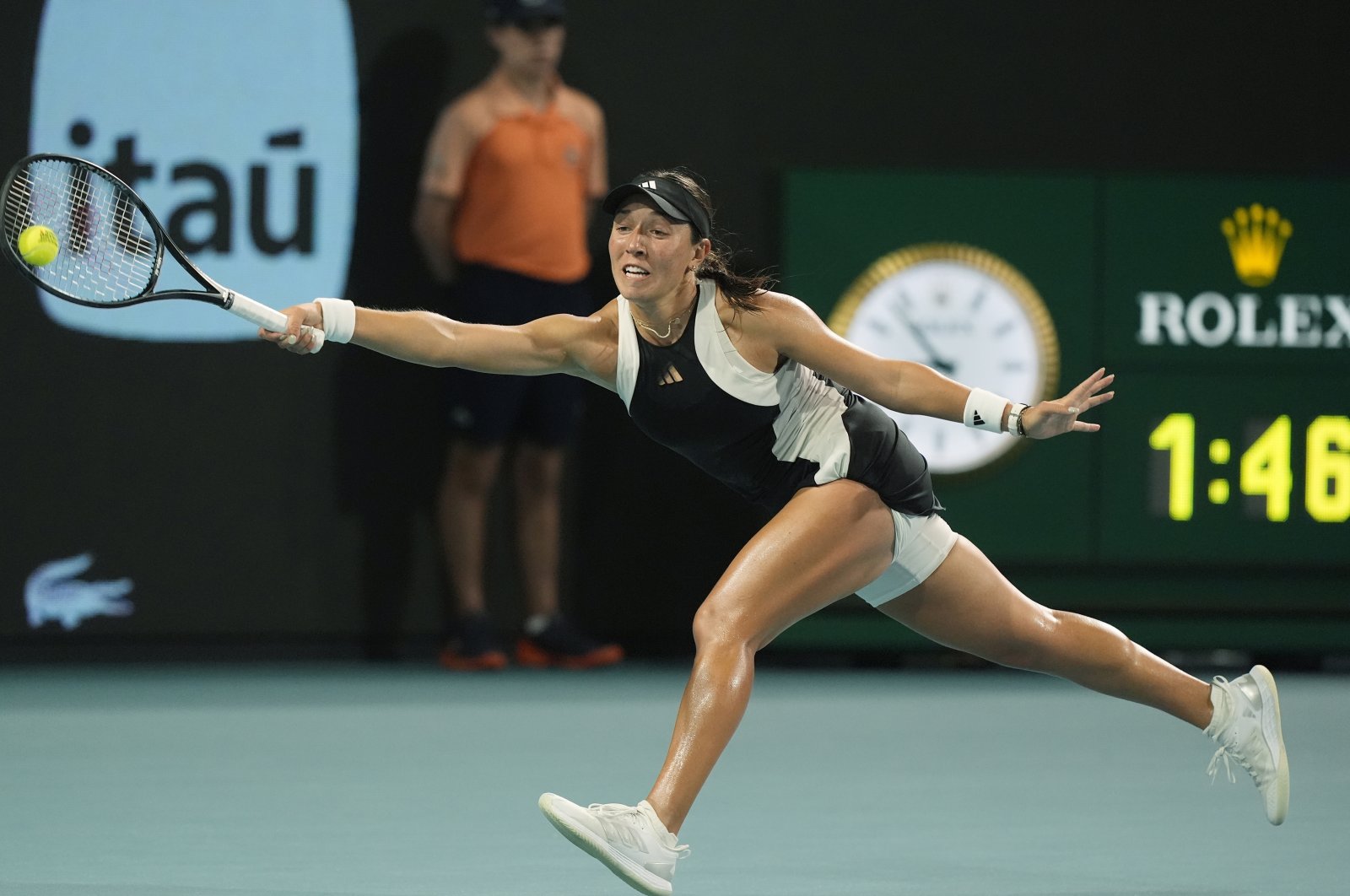 Jessica Pegula stretches for a shot from Ekaterina Alexandrova during the Miami Open tennis tournament, Miami, U.S., March 27, 2024. (AP Photo)