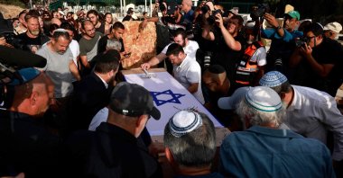 Mourners attend the funeral of Shani Louk, a German-Israeli who was taken hostage on the Oct. 7 by Hamas, in the central Israeli settlement of Srigim, May 19, 2024. (AFP Photo)