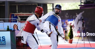 Turkish para taekwondo athlete Mahmut Bozteke (R) in action at the European championship, Belgrade, Serbia, May 10, 2024. (AA Photo)