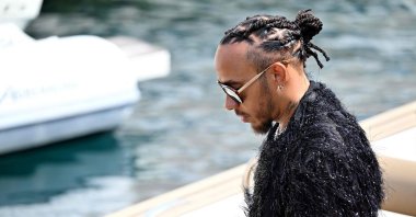 Mercedes' British driver Lewis Hamilton arrives by boat in the paddock of the Circuit de Monaco two days ahead of the Formula One Monaco Grand Prix, Monte Carlo, Monaco, May 24, 2024. (AFP Photo)