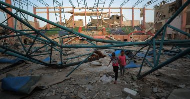 Palestinian children are seen at a sports facility destroyed in Israeli attack on Gaza, Palestine, May 24, 2024. (AA Photo)