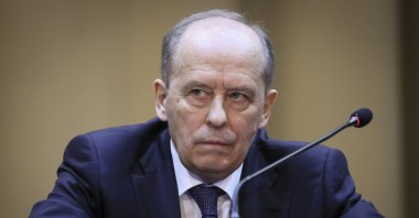 Federal Security Service (FSB) director Alexander Bortnikov listens as Russian President Vladimir Putin delivers his speech during a meeting of the Federal Security Service (FSB) board in Moscow, Russia, Tuesday, Feb. 28, 2023. (Sputnik, Kremlin Pool Photo via AP)