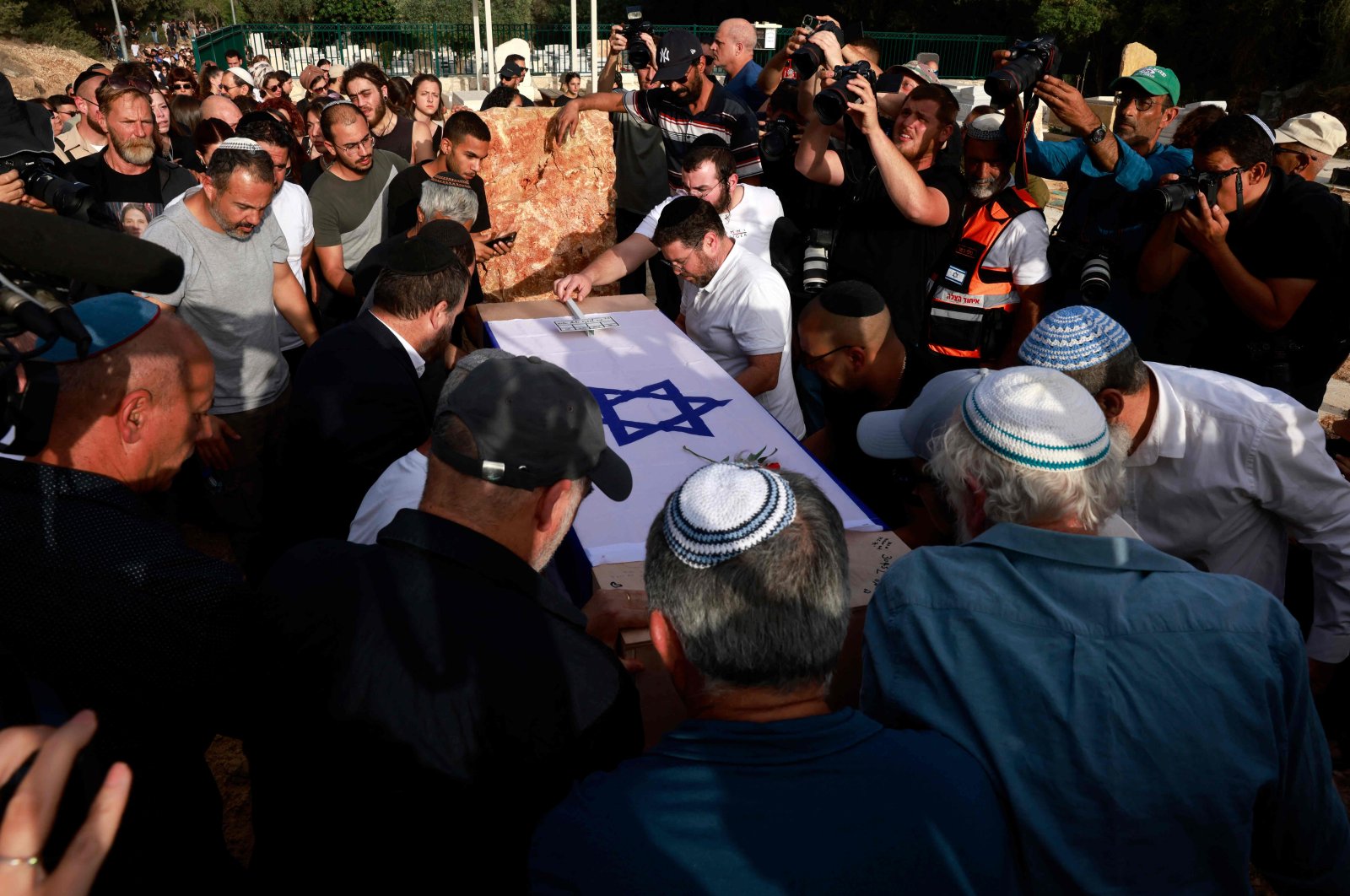 Mourners attend the funeral of Shani Louk, a German-Israeli who was taken hostage on the Oct. 7 by Hamas, in the central Israeli settlement of Srigim, May 19, 2024. (AFP Photo)