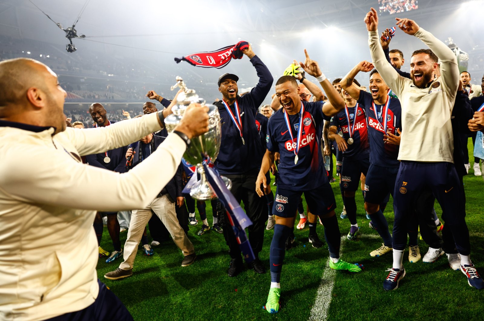 Kylian Mbappe of PSG celebrates with teammates after winning the Coupe de France Final against Olympique Lyon, Lille, France, May 25, 2024. (EPA Photo)