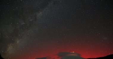 A view shows the lights of an aurora australis caused by a geomagnetic storm over Villarrica volcano, Pucon, Chile, May 10, 2024. (Reuters Photo)