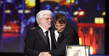 Sean Baker (R) receives the Palme D&#039;Or Award for &quot;Anora&quot; from George Lucas (L) during the closing and awards ceremony of the 77th annual Cannes Film Festival, Cannes, France, May 25, 2024. (EPA Photo)