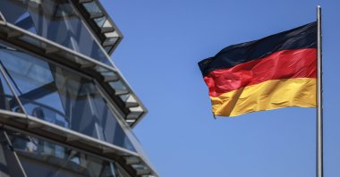 A German flag flutters in the wind on top of the Bundestag, Berlin, Germany, May 15, 2024. (EPA Photo)