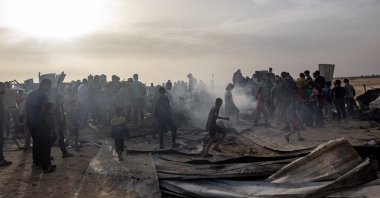 Palestinians inspect the damage after an Israeli airstrike on a tent camp at an area designated for displaced people in Rafah, southern Gaza Strip, Palestine, May 27, 2024. (EPA Photo)