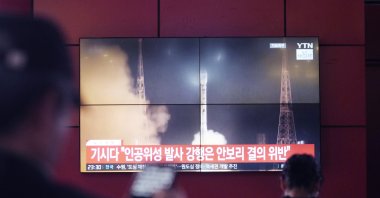 A TV screen shows a file image of North Korea&#039;s rocket launch during a news program at a bus terminal in Seoul, South Korea, Monday, May 27, 2024. (AP Photo)