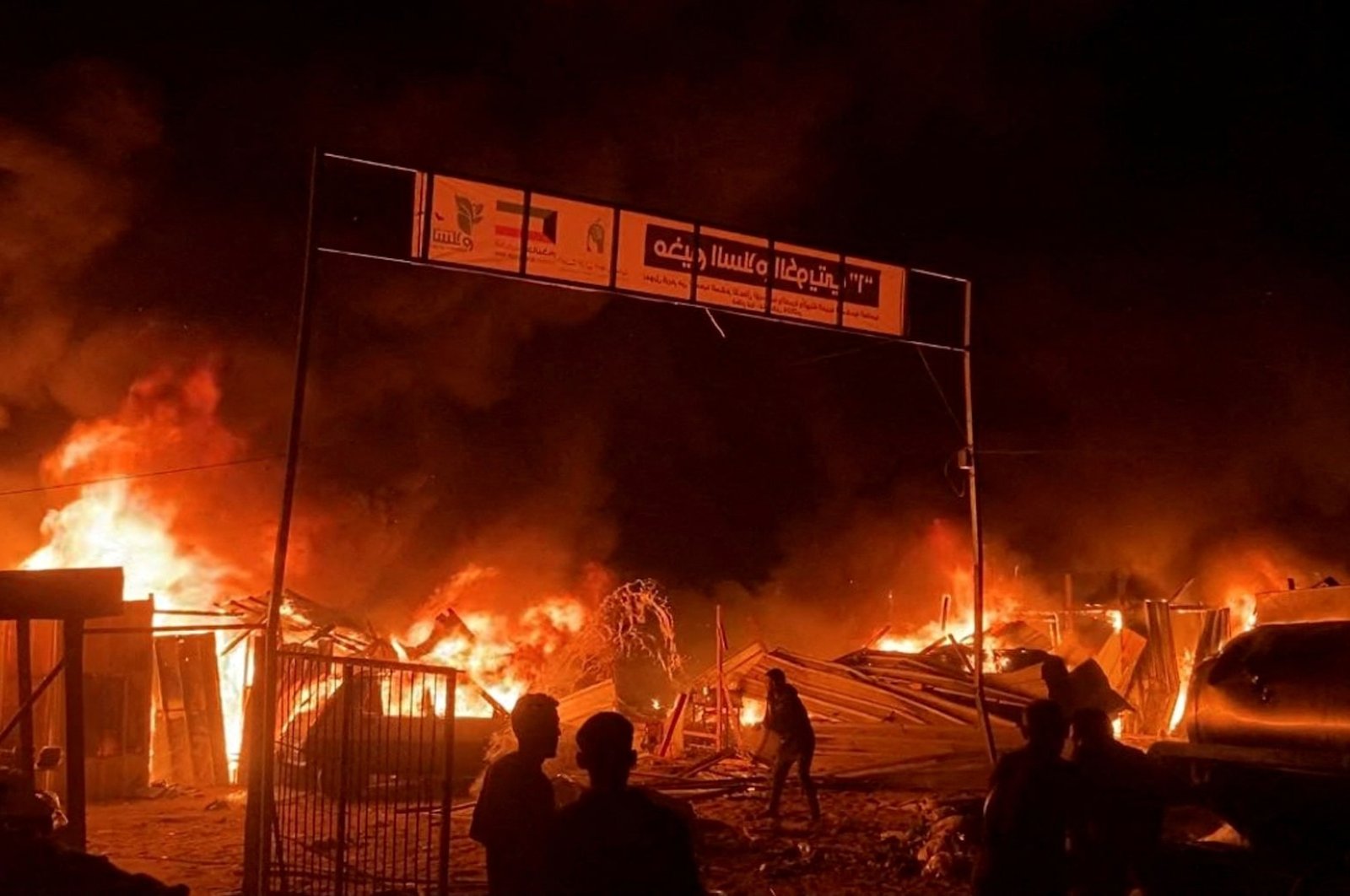 A designated area for displaced people burns after an Israeli strike, Rafah, southern Gaza, Palestine, May 26, 2024. (Reuters Photo)