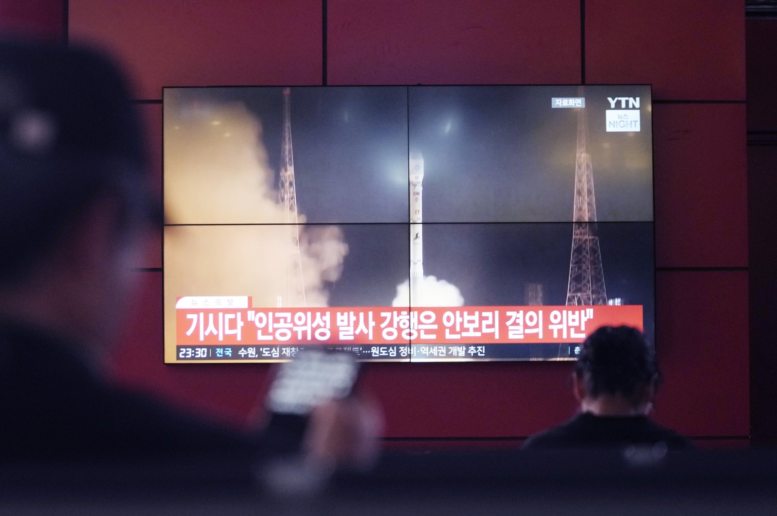 A TV screen shows a file image of North Korea&#039;s rocket launch during a news program at a bus terminal in Seoul, South Korea, Monday, May 27, 2024. (AP Photo)
