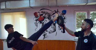 Turkish taekwondo athlete Furkan Ubeyde Çamoğlu (L) trains at the Trabzon Metropolitan Municipality Sports Club, Trabzon, Türkiye, May 21, 2024. (AA Photo)