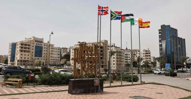 (L-R) The flags of Norway, South Africa, Palestine, Ireland, and Spain, are raised at an entrance of Ramallah city in the occupied West Bank, Palestine, May 28, 2024. (AFP Photo)