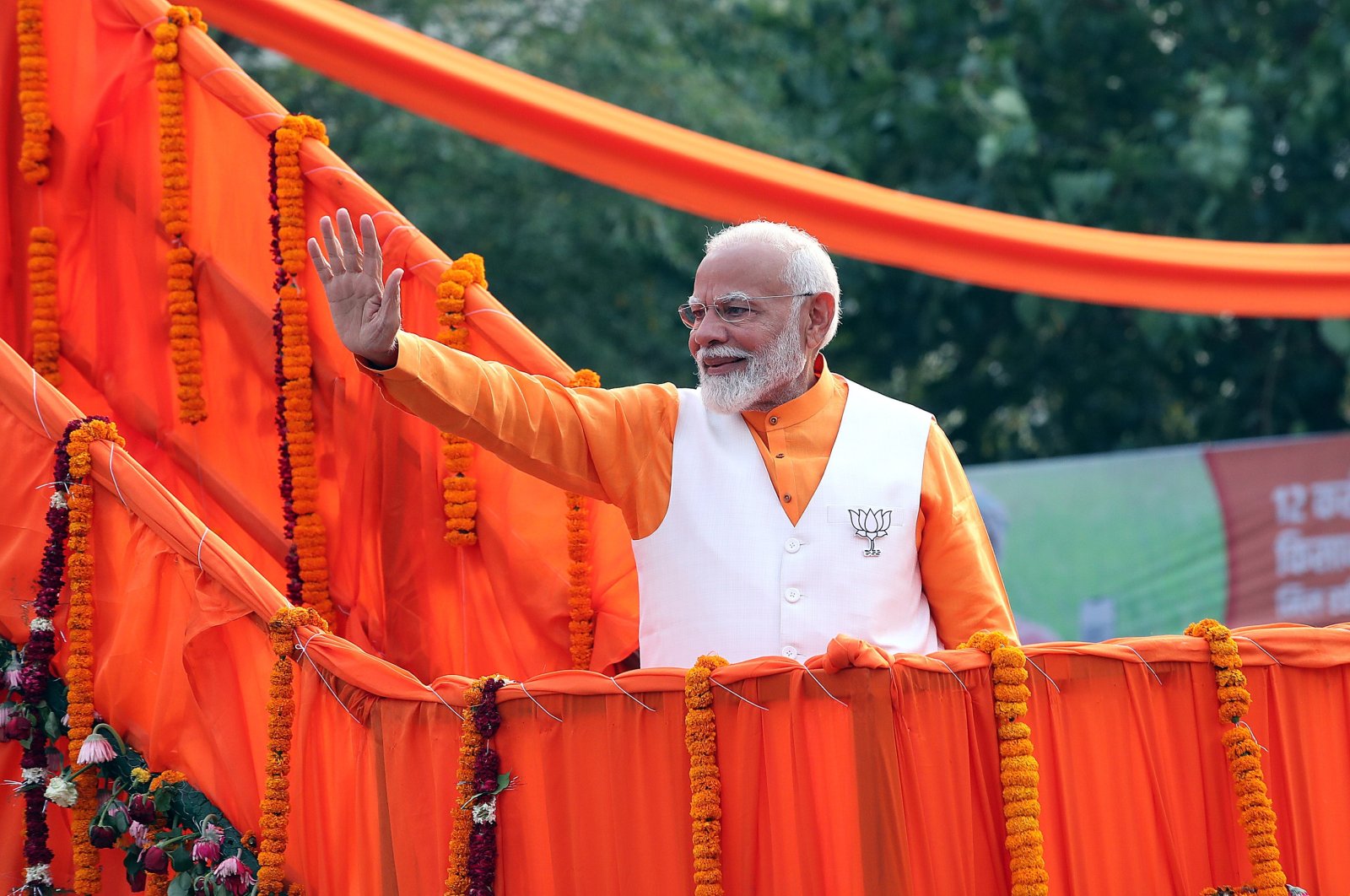 Indian Prime Minister Narendra Modi greets supporters during a roadshow in Varanasi, Uttar Pradesh, India, May 13, 2024. (EPA Photo)