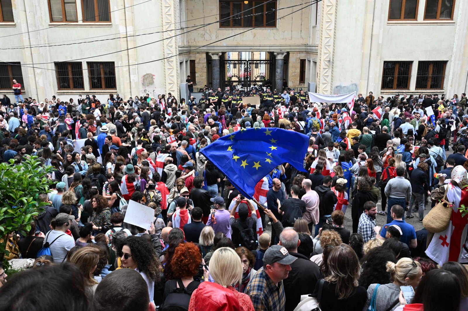 Demonstrators protesting the &quot;foreign influence&quot; law crowd outside the parliament building in central Tbilisi, May 28, 2024. (AFP Photo)